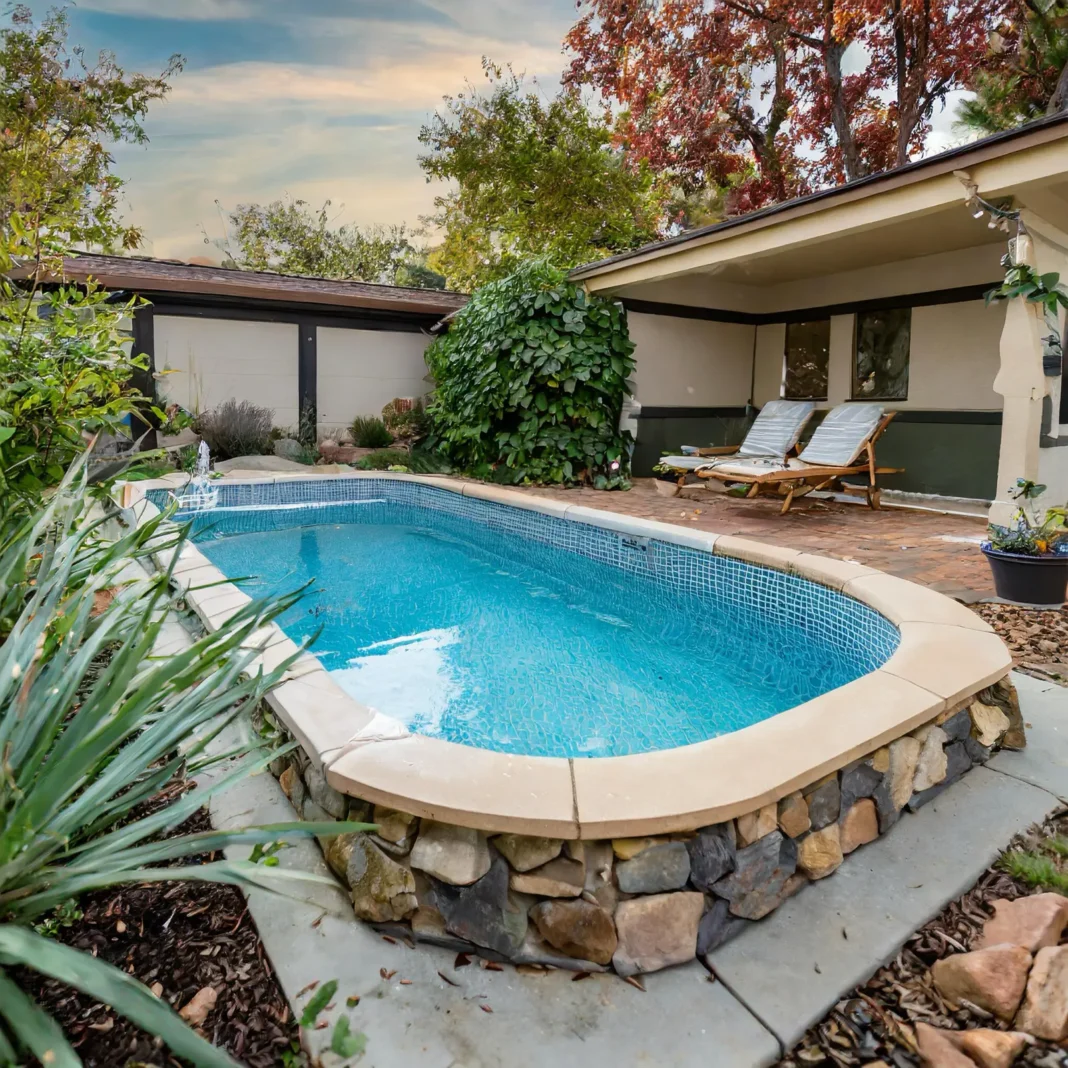 A small backyard semi inground pool